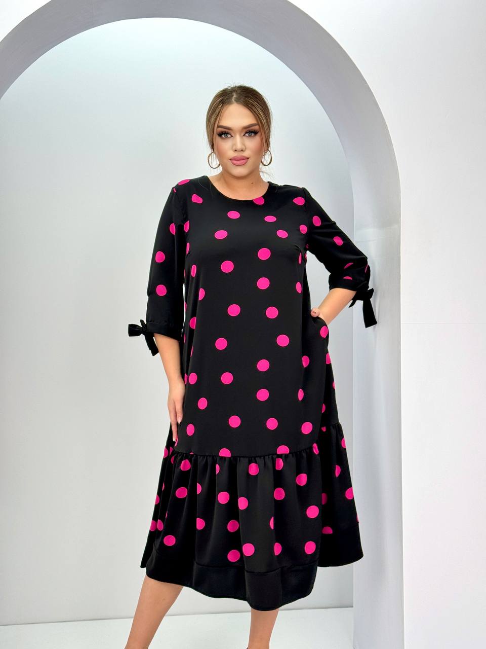 Women's bright polka dot mid-length dress - a versatile and comfortable style