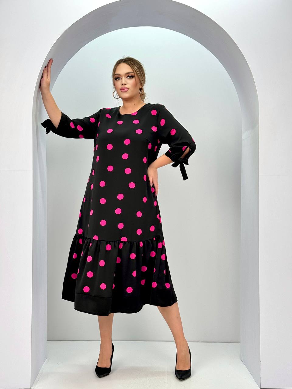Women's bright polka dot mid-length dress - a versatile and comfortable style