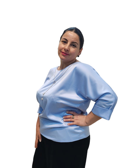 Fashionable silk blouse decorated with a chain - the ideal choice of style and comfort